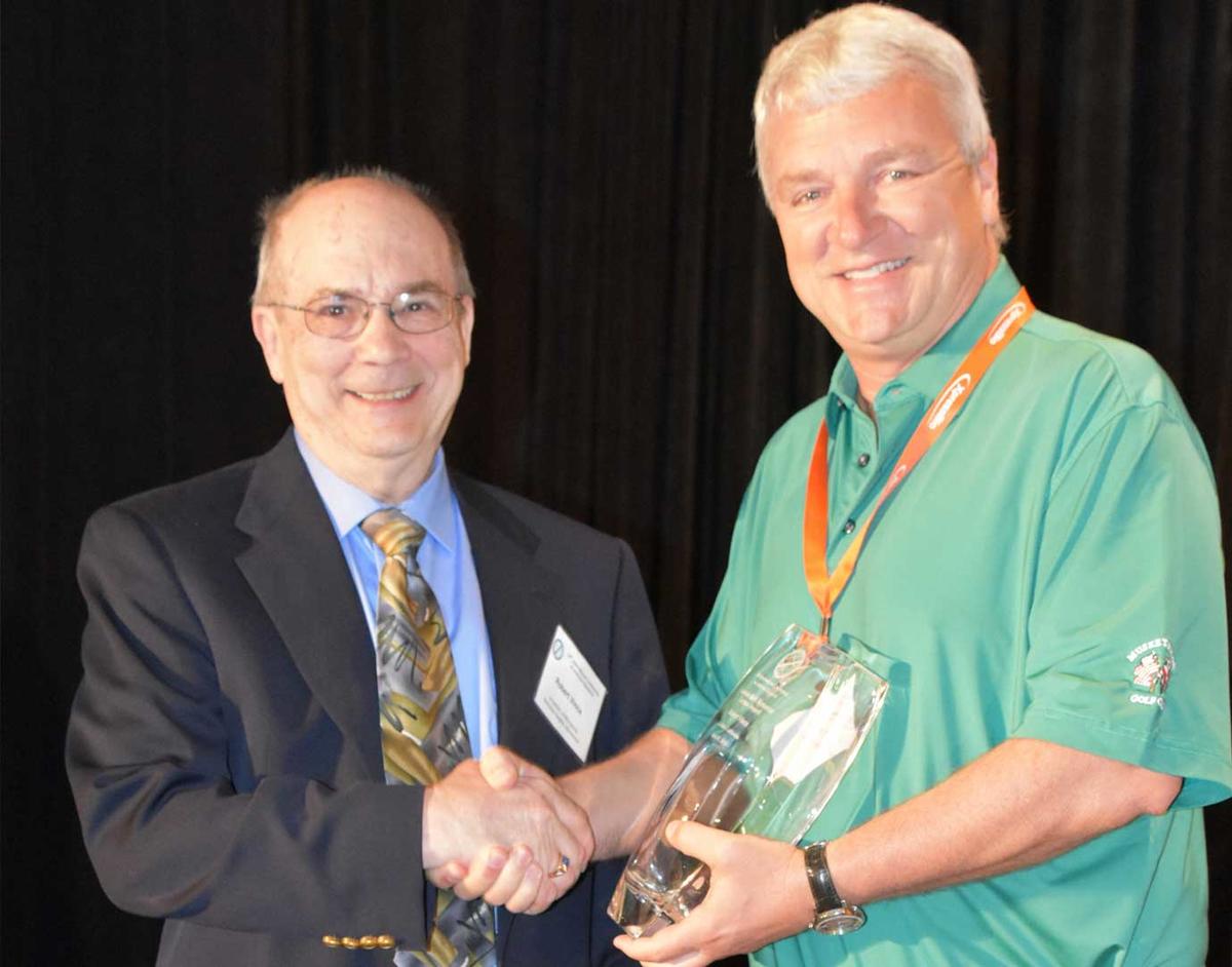 Prof Vince receiving award